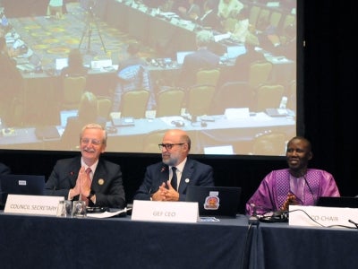 People at a speaking table